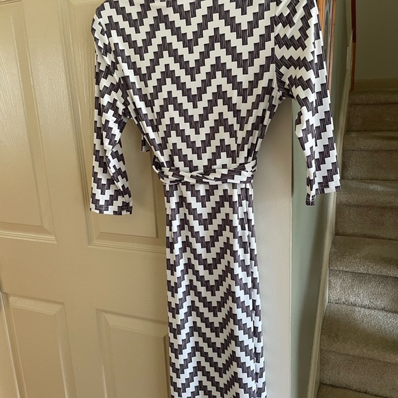Faux wrap dress/ belt in small.  Black and white print.  3/4 sleeves. length 40” - Picture 1 of 2